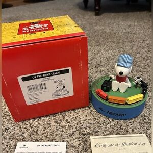 Hallmark Snoopy Figurine with Blue Base and Multi-Colored Train new